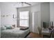 Bright bedroom with a large window, neutral walls, and a ceiling fan at 1100 Lake Shadow Cir # 2101, Maitland, FL 32751