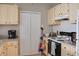 Fully equipped kitchen with sleek countertops and updated appliances at 1100 Lake Shadow Cir # 2101, Maitland, FL 32751