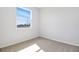 Bedroom featuring neutral carpet and one window providing natural light at 636 Hennepin Loop, Lake Wales, FL 33898