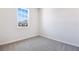 Cozy bedroom with neutral carpet and one window offering natural light at 636 Hennepin Loop, Lake Wales, FL 33898