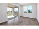 Living room featuring tile floors, sliding glass doors, and one window at 636 Hennepin Loop, Lake Wales, FL 33898