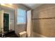 Clean bathroom with tile flooring and bathtub shower combo at 14642 Yellow Butterfly Rd, Windermere, FL 34786