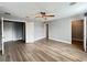 Bright bedroom with wood-look floors and ceiling fan at 14642 Yellow Butterfly Rd, Windermere, FL 34786