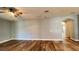 Bright living room with wood-look floors and neutral walls at 14642 Yellow Butterfly Rd, Windermere, FL 34786