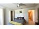 Bedroom with a bed and access to a bathroom at 325 Ashley Loop, Davenport, FL 33837