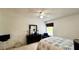 Comfortable bedroom with ceiling fan, dresser, and window at 325 Ashley Loop, Davenport, FL 33837