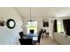 Dining room with table and chairs, view to backyard from sliding glass doors at 325 Ashley Loop, Davenport, FL 33837