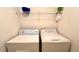 Clean laundry room, complete with washer and dryer for your convenience at 325 Ashley Loop, Davenport, FL 33837