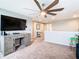 Spacious loft area with ceiling fan and TV at 592 Lake Smart Blvd, Winter Haven, FL 33881