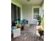 Inviting outdoor patio area with cozy seating, perfect for relaxing and enjoying the tranquil surroundings at 742 San Joaquin Rd, Poinciana, FL 34759