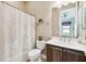 Clean bathroom with shower/tub combo and updated vanity at 154 Rancho Mirage Dr, Kissimmee, FL 34759