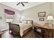 Second bedroom with a full bed and built-in desk at 154 Rancho Mirage Dr, Kissimmee, FL 34759