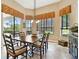 Breakfast nook with wood table and view of backyard at 154 Rancho Mirage Dr, Kissimmee, FL 34759
