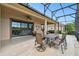 Spacious covered patio with seating area and dining table at 154 Rancho Mirage Dr, Kissimmee, FL 34759