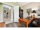 Home office with built-in shelving and hardwood floors at 154 Rancho Mirage Dr, Kissimmee, FL 34759