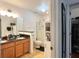 Full bathroom featuring double sinks, granite countertop and shower at 721 Interlude Ln # 105, Orlando, FL 32824