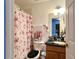 Bathroom featuring a toilet with black seat and vanity with a granite countertop at 721 Interlude Ln # 105, Orlando, FL 32824