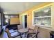 Relaxing outdoor patio with comfortable seating and a view, perfect for entertaining or quiet enjoyment at 721 Interlude Ln # 105, Orlando, FL 32824