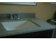 Bathroom vanity with single sink and granite countertop at 267 Cranbrook Dr, Kissimmee, FL 34758