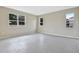 Spacious bedroom with large windows and grey carpet at 1446 Maddie Berry Ln, Kissimmee, FL 34744
