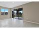 Bright dining area with sliding glass doors leading to the backyard at 1446 Maddie Berry Ln, Kissimmee, FL 34744