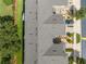 Aerial view of townhouses and surrounding landscape at 9532 Silver Buttonwood St, Orlando, FL 32832