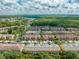 Aerial view of townhouses and community at 9532 Silver Buttonwood St, Orlando, FL 32832