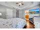 Main bedroom with ensuite bathroom and walk-in closet at 9532 Silver Buttonwood St, Orlando, FL 32832
