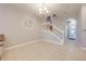 Bright dining room features tile flooring and staircase at 9532 Silver Buttonwood St, Orlando, FL 32832