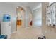 Spacious entryway with tile floors and views into kitchen and living areas at 9532 Silver Buttonwood St, Orlando, FL 32832