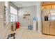Convenient entryway with water cooler and storage at 9532 Silver Buttonwood St, Orlando, FL 32832