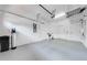 Clean and spacious garage with overhead storage at 9532 Silver Buttonwood St, Orlando, FL 32832