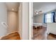 Hallway with access to bedroom and stairs at 9532 Silver Buttonwood St, Orlando, FL 32832
