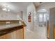 Modern kitchen with dishwasher and wood cabinets at 9532 Silver Buttonwood St, Orlando, FL 32832