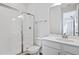 Clean bathroom with white vanity and glass shower at 1416 Maddie Berry Ln, Kissimmee, FL 34744