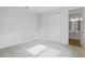 Bedroom with double door closet and access to bathroom at 1416 Maddie Berry Ln, Kissimmee, FL 34744