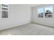 Bright bedroom with neutral walls and grey carpeting at 1416 Maddie Berry Ln, Kissimmee, FL 34744