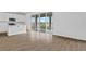 Kitchen with island and sliding glass doors to patio at 1416 Maddie Berry Ln, Kissimmee, FL 34744