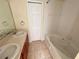 Double vanity bathroom with soaking tub and separate closet at 2060 Cypress Bay Blvd, Kissimmee, FL 34743
