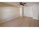Spacious living room featuring tile floors and ceiling fan at 2060 Cypress Bay Blvd, Kissimmee, FL 34743