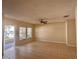 Bright living room with tile floors and sliding glass doors leading to backyard at 2060 Cypress Bay Blvd, Kissimmee, FL 34743