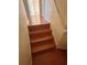 Wooden stairs leading to the upper level at 2060 Cypress Bay Blvd, Kissimmee, FL 34743