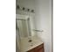 Simple bathroom with a vanity and mirror at 2211 San Vittorino Cir # 106, Kissimmee, FL 34741