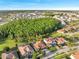 Beautiful aerial view of a residential area surrounded by green spaces and landscaping at 2891 Swoop Cir, Kissimmee, FL 34741