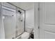 Bright bathroom with a glass-enclosed shower and toilet at 2891 Swoop Cir, Kissimmee, FL 34741