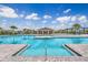 Resort-style community pool with lounge area at 883 Griffon Ave, Lake Alfred, FL 33850