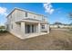 Two-story house with covered patio at 883 Griffon Ave, Lake Alfred, FL 33850