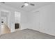 Bedroom with carpet, ceiling fan and en-suite bathroom at 3875 Bowfin Trl, Kissimmee, FL 34746