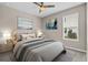 Bedroom with a queen-size bed and neutral decor at 3875 Bowfin Trl, Kissimmee, FL 34746