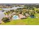 Resort-style community pool with clubhouse and landscaping at 3875 Bowfin Trl, Kissimmee, FL 34746